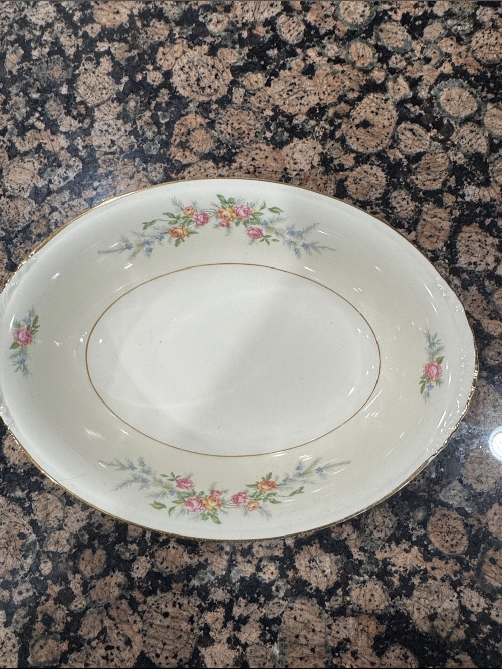 Nautilus Ivory Porcelain Serving Bowl with Pink and Yellow Floral Accents